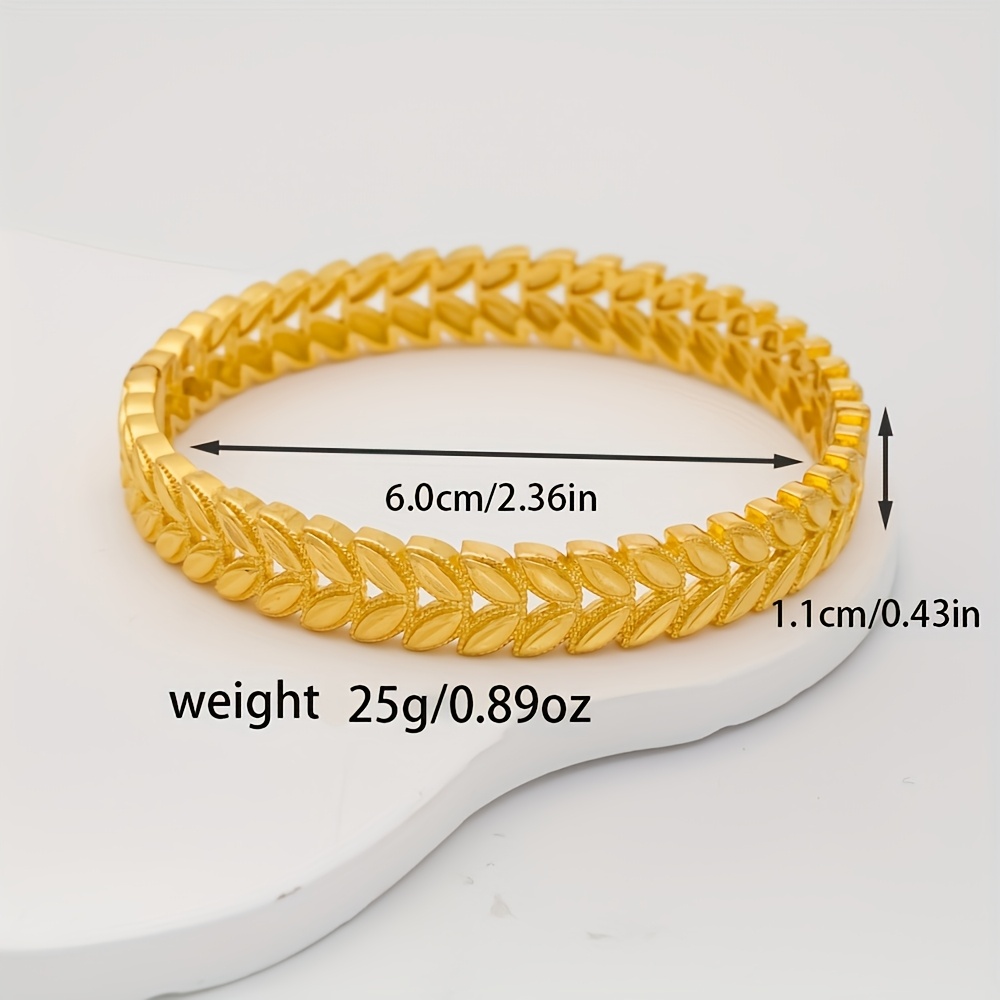 Adjustable Cuff Bracelet with Intricate Leaf Pattern